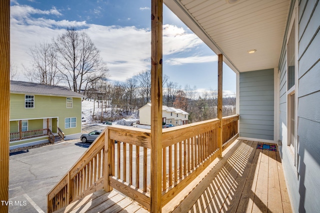 view of snow covered deck