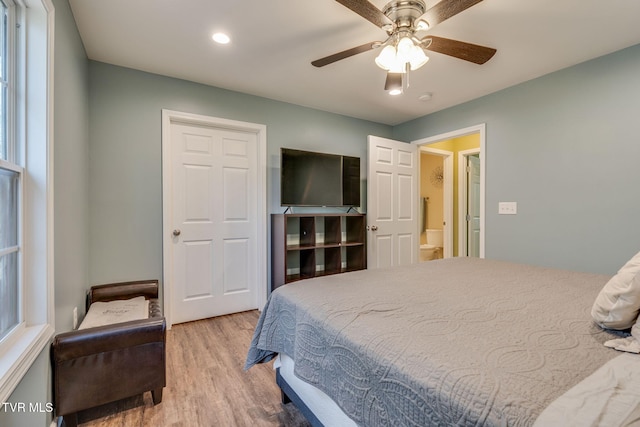 bedroom featuring ceiling fan and light hardwood / wood-style floors