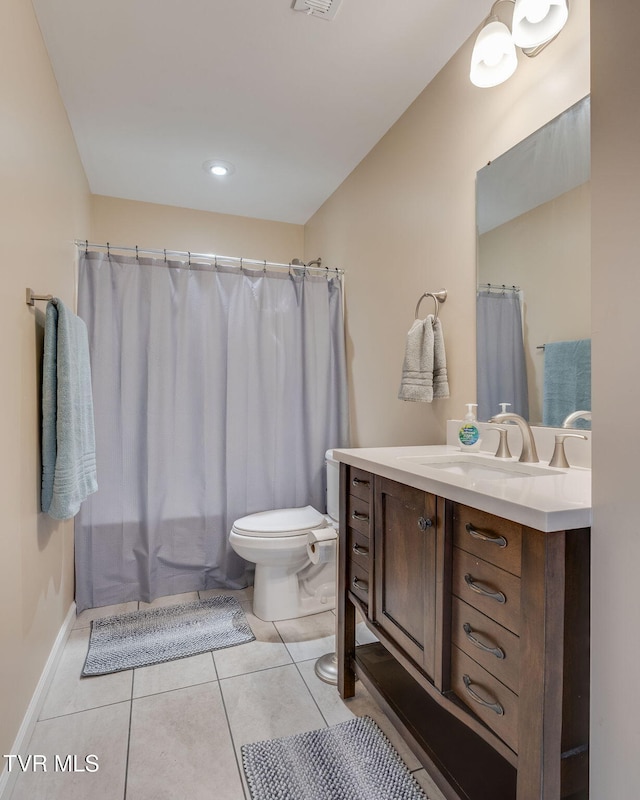 full bathroom featuring toilet, tile patterned floors, shower / bath combo, and vanity