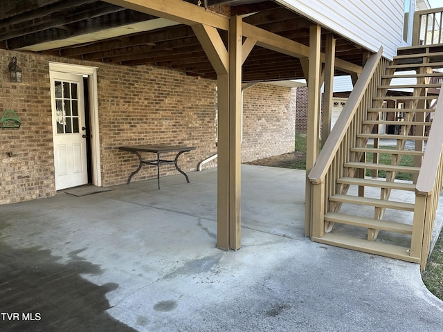 view of patio with stairway