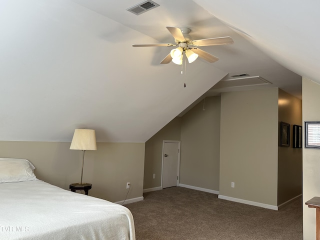 carpeted bedroom featuring ceiling fan, baseboards, visible vents, and vaulted ceiling