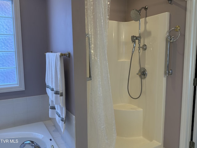 bathroom featuring a shower stall