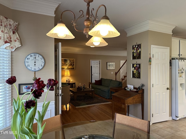 dining space with stairs, crown molding, and light tile patterned flooring