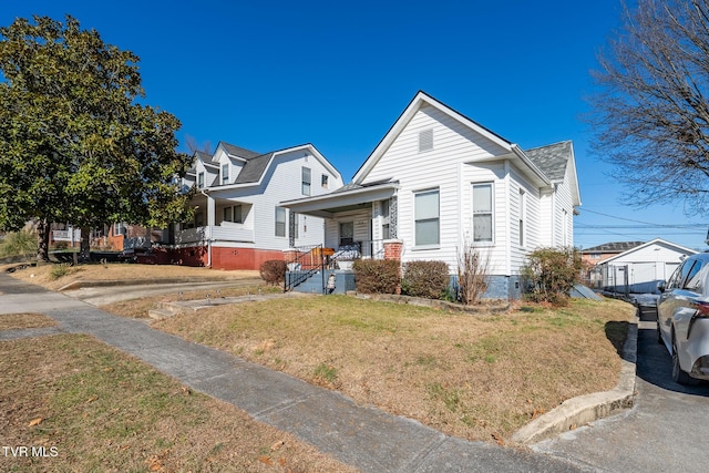 view of front of property featuring covered porch and a front lawn