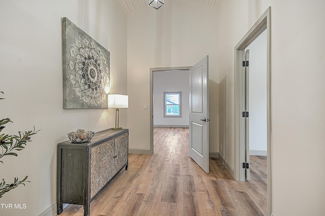 hallway featuring light wood-type flooring