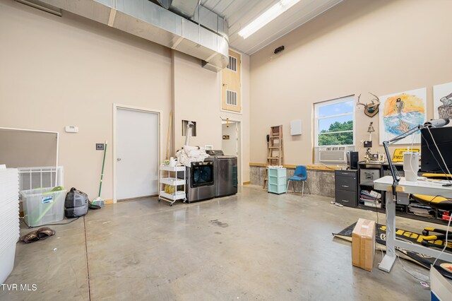 garage featuring washer and clothes dryer