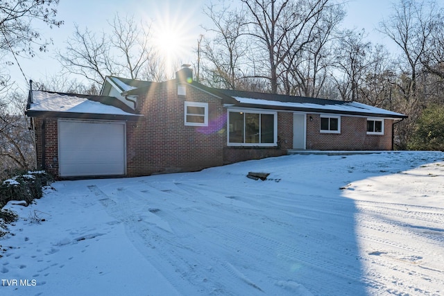 ranch-style home with a garage