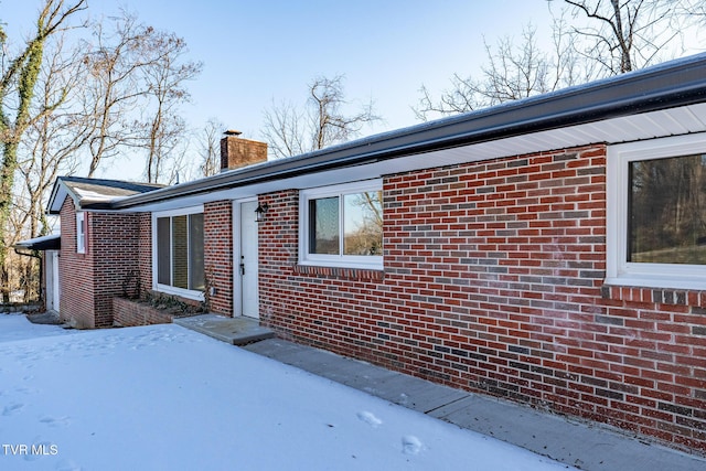 view of snow covered property