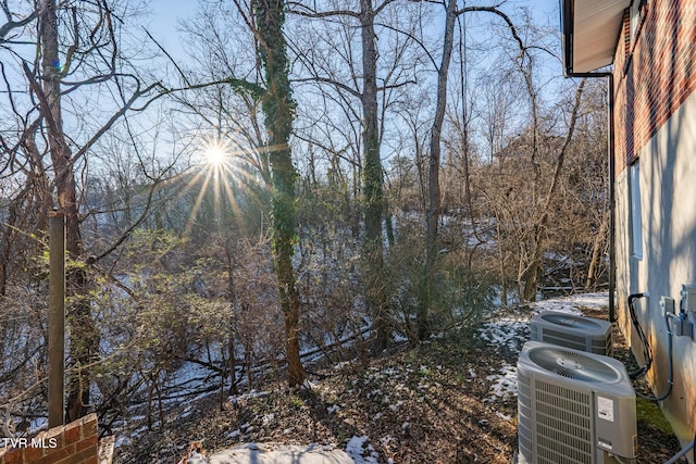 view of yard with central AC