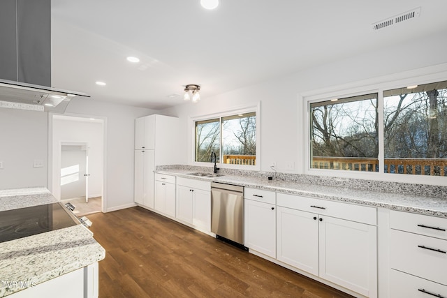 kitchen with white cabinetry, dishwasher, and sink