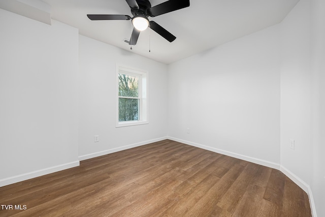 unfurnished room with ceiling fan and wood-type flooring