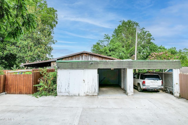 garage with a carport