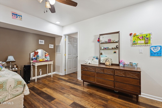 bedroom featuring dark hardwood / wood-style floors and ceiling fan