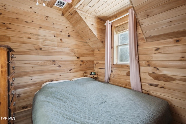 unfurnished bedroom with wood ceiling and wood walls