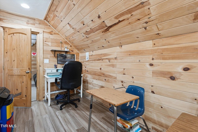 office with hardwood / wood-style flooring, lofted ceiling, wooden ceiling, and wood walls