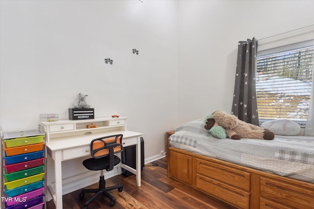 bedroom featuring dark hardwood / wood-style floors