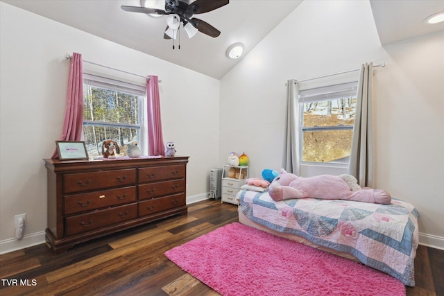 bedroom with dark wood-type flooring, ceiling fan, and lofted ceiling