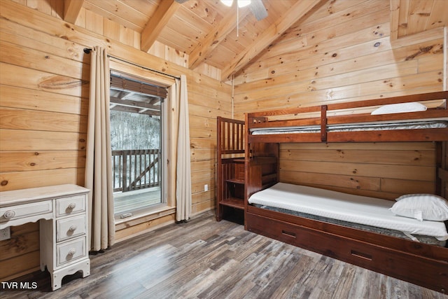 bedroom featuring wooden walls, access to outside, dark hardwood / wood-style flooring, lofted ceiling with beams, and wood ceiling