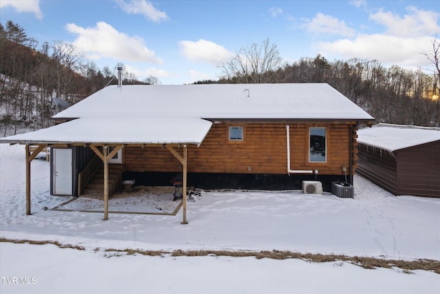 view of snow covered property