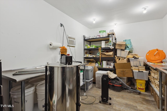 storage area featuring an AC wall unit