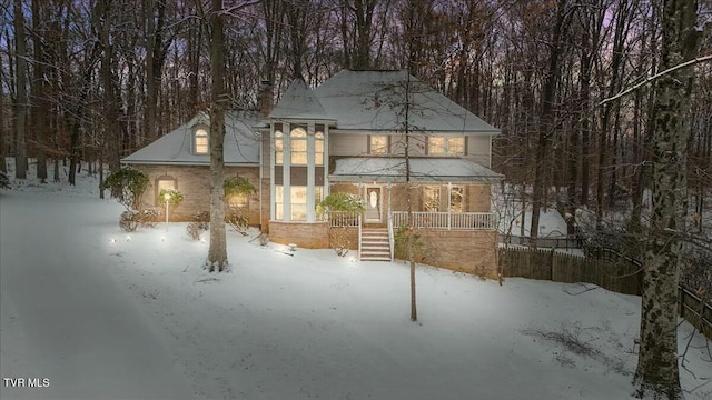 view of front of home featuring covered porch