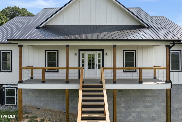 376 Wilcox Cir, Jonesborough, TN 37659 - modern inspired farmhouse with covered porch, stairway, metal roof, and board and batten siding