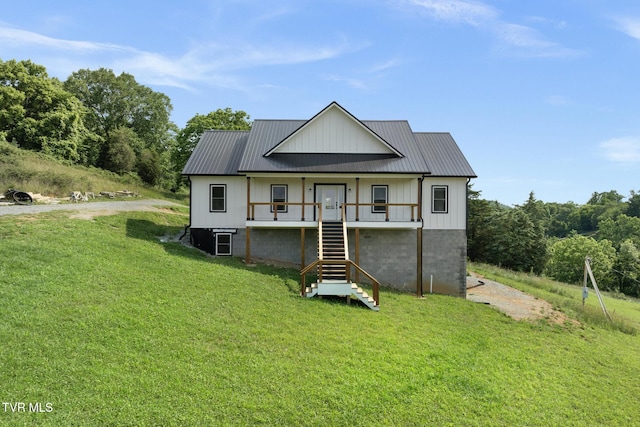 376 Wilcox Cir, Jonesborough, TN 37659 - view of front of home with stairway, a front yard, metal roof, and board and batten siding