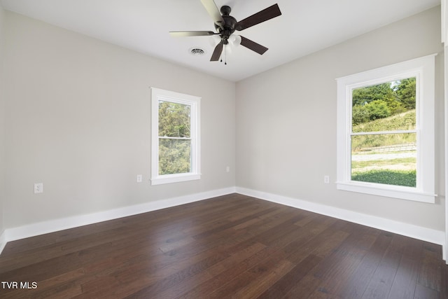 376 Wilcox Cir, Jonesborough, TN 37659 - spare room featuring dark wood finished floors, a ceiling fan, and baseboards