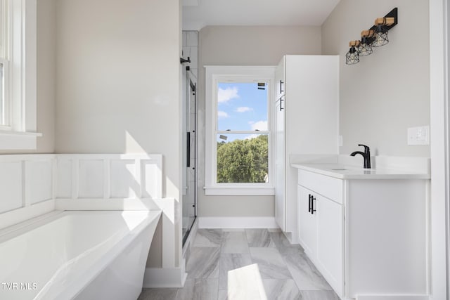 376 Wilcox Cir, Jonesborough, TN 37659 - full bath featuring a bath, a shower stall, vanity, and baseboards