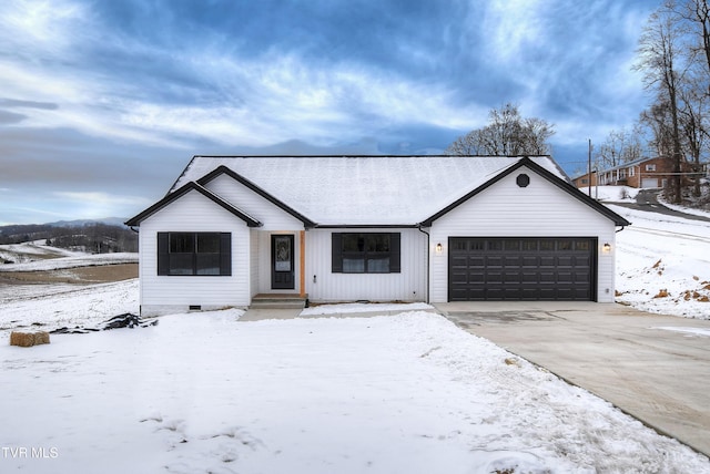 ranch-style home featuring a garage