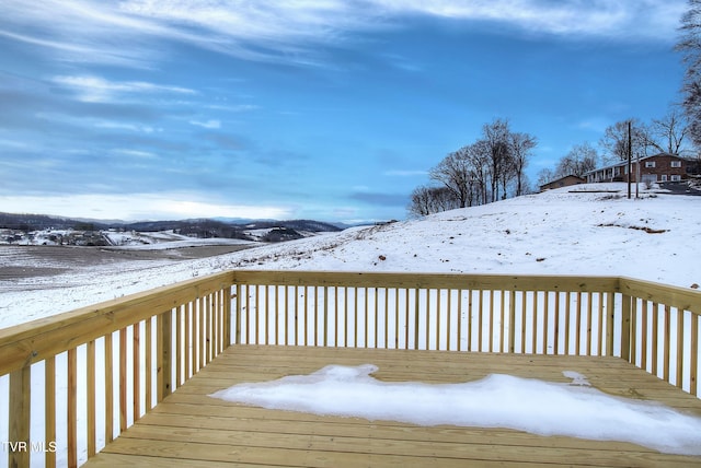 view of snow covered deck