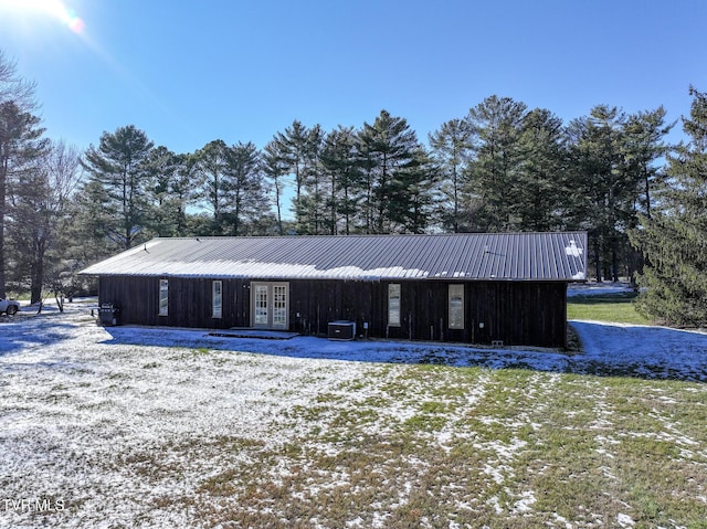 view of outbuilding featuring french doors