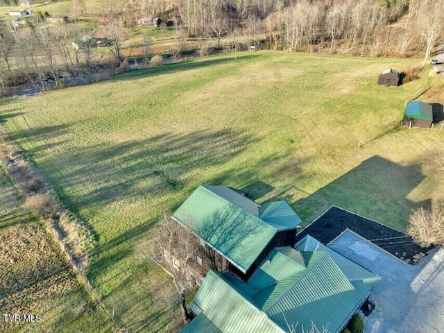 birds eye view of property featuring a rural view