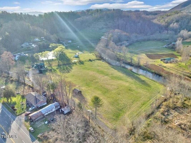 aerial view with a water view and a rural view