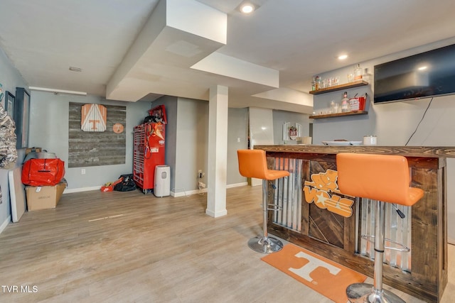 bar featuring wood-type flooring