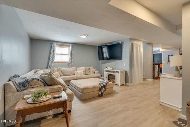 living room featuring light wood-type flooring