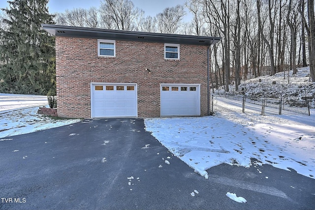 exterior space featuring a garage