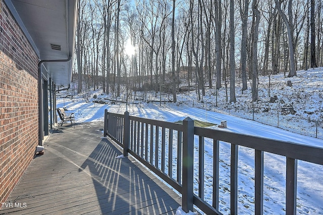 view of snow covered deck