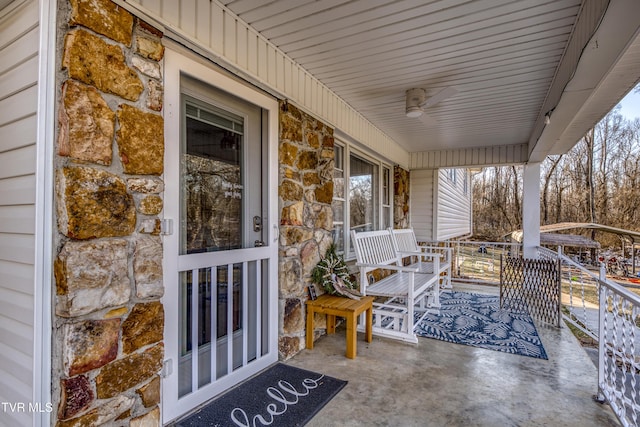 view of patio featuring ceiling fan