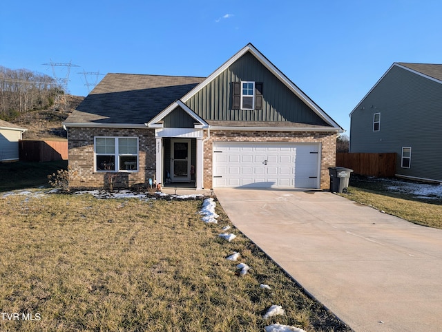 view of front of house featuring a garage and a front yard