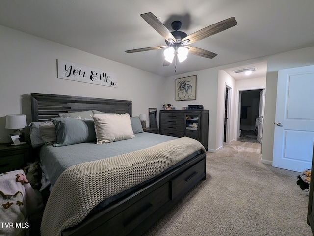 bedroom with ceiling fan and light colored carpet