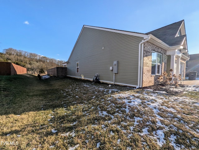 view of home's exterior featuring a yard