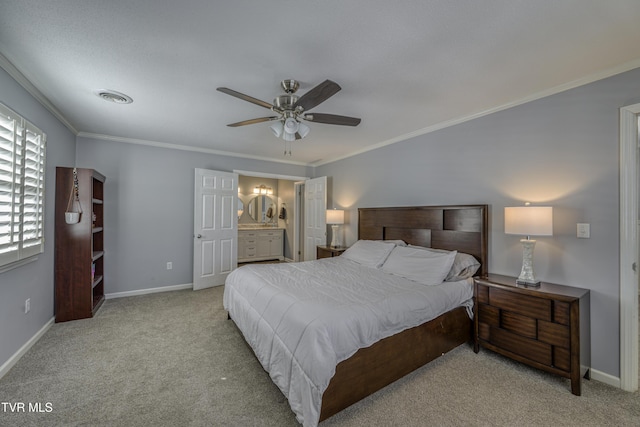 bedroom with ceiling fan, ornamental molding, ensuite bath, and light carpet