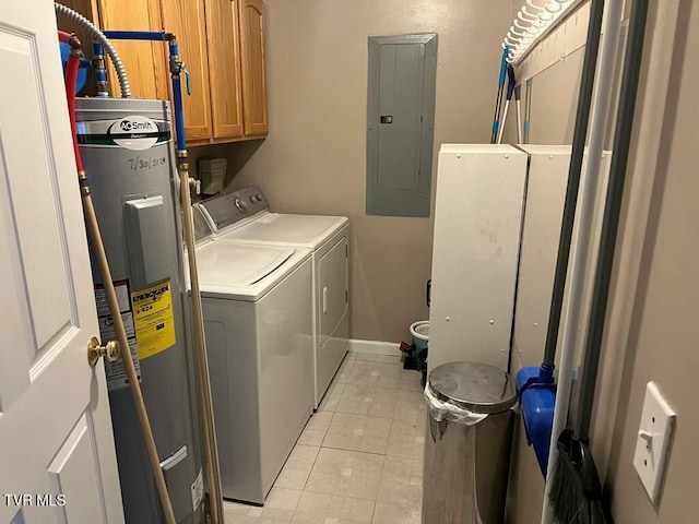 clothes washing area with cabinet space, electric panel, baseboards, independent washer and dryer, and water heater