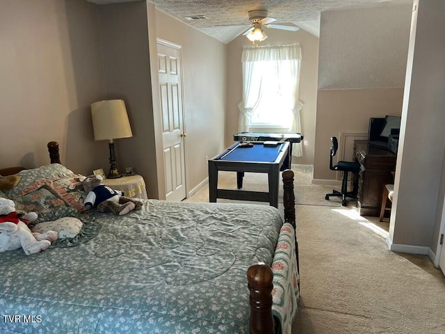 bedroom with visible vents, light colored carpet, vaulted ceiling, a textured ceiling, and baseboards