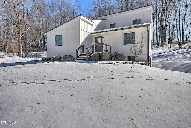 view of snow covered house