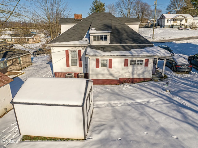 view of front of property with cooling unit