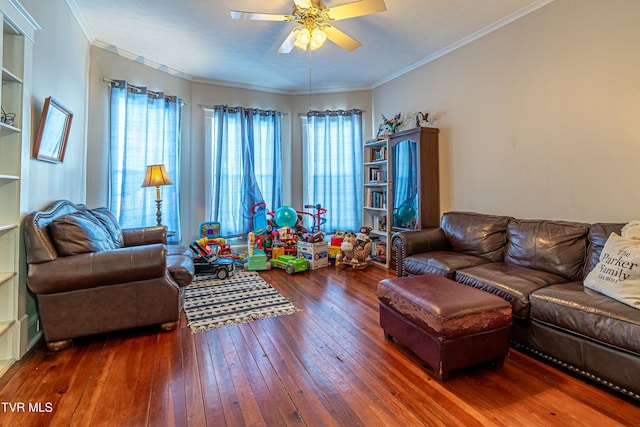 living room featuring crown molding, plenty of natural light, dark hardwood / wood-style floors, and ceiling fan