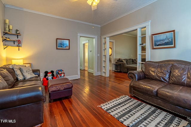 living room featuring crown molding, dark hardwood / wood-style floors, and ceiling fan