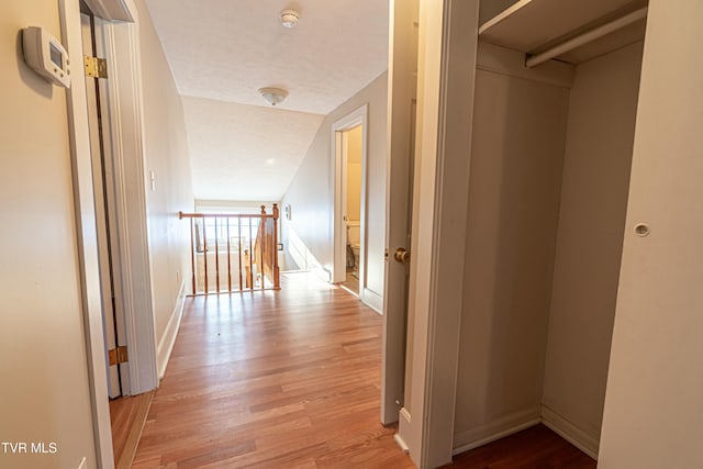 corridor featuring light wood-type flooring